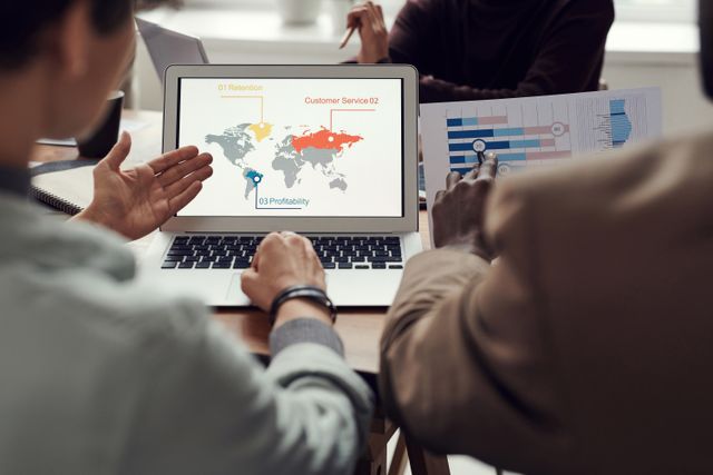 Business analyst reviewing market and competitor data